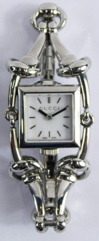 A Gucci silver plated fashion watch, in original fitted box.