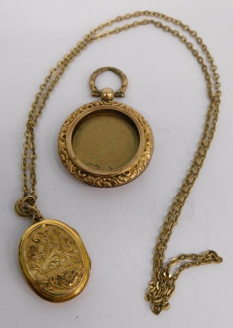 An early 20thC photograph pendant, with gold back section marked 9ct, 4cm high, a small pendant and slender link chain, 8.2g all in.