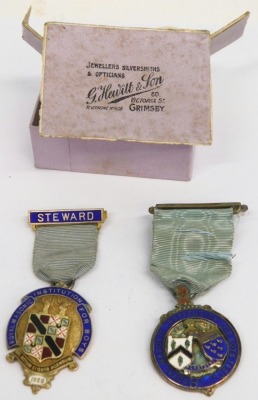 Two Royal Masonic Institution for Boys silver gilt and enamel jewels, with Steward clasps to the ribbon, 8cm high, in associated Hewitt and Sons box. - 2