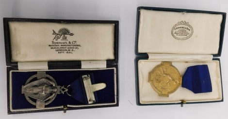 Two silver Masonic jewels, one marked Gratitude Arthur CM, in J Kenning and Sons box, the other Bro. F. Patman No 277C, in Spencer and Co box. (2)