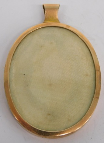 An oval portrait miniature frame, the plain surround marked AW9C, 6cm high.