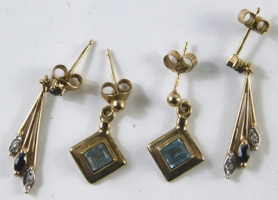 Two pairs of 9ct gold drop earrings, comprising a square set, set with central aquamarine, and a pair of sapphire and diamond three tier sprays, 3.4g all in. (2)