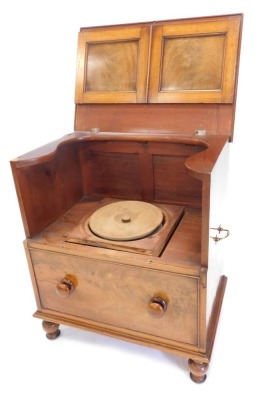 A 19thC mahogany box commode, the hinged panel front above single drawer on turned legs with brass side handles and fitted interior, 76cm high 67cm wide 49cm deep.