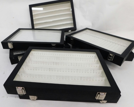 A quantity of jewellery display cases, with black buckle sides and white lined interiors. (a quantity)