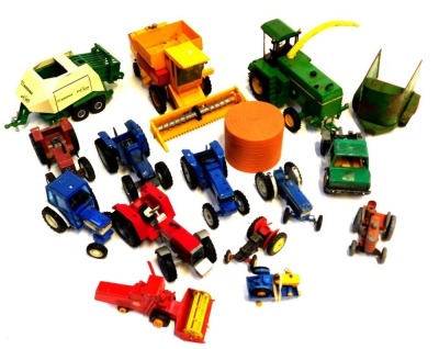 Ertl and Britains diecast, including a John Deere combine harvester, New Holland TR85 combine harvester, Ford 2120 tractor, Ford 7710 tractor, Massey Ferguson 3680 tractor, Crone Big Pack Multi Cut baler, etc. (1 box)