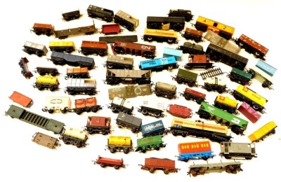 Hornby, Triang, and other rolling stock, including brake vans, milk tankers, Esso tankers, Schweppes Tonic Water wagon, Grimsby Fish van, etc. (1 box)