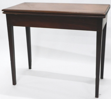 A George III mahogany tea table, with folding rectangular top and square taper legs, 88cm wide.