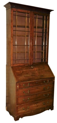 A 19thC plum pudding mahogany bureau bookcase, with moulded cornice over two astragal glazed doors, the fall flap resting on lopers and revealing fitted interior, over four graduated drawers with bracket feet, 232cm high, 100cm wide.