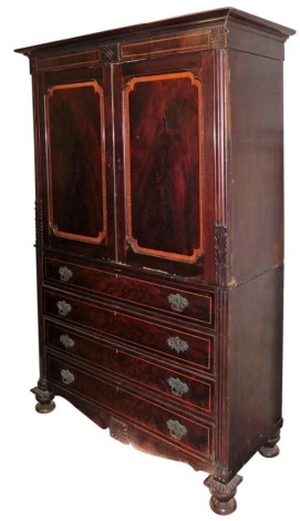 A George III mahogany linen press, with moulded cornice, two shaped and satinwood cross banded doors over four chequer banded drawers, with cast loop handles, on gadrooned and turned feet, 217cm high, 150cm wide.