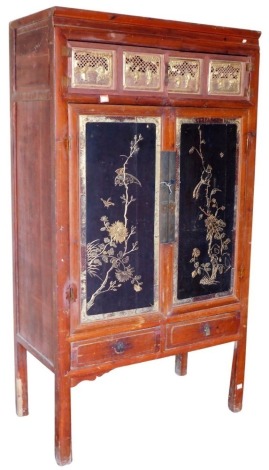 A Chinese gilt and scratch carved cabinet, 178cm high, 98cm wide.