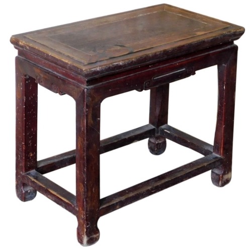 A Chinese hardwood table, 52cm high, 57cm wide, 34cm deep.