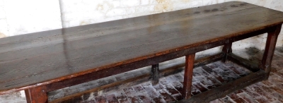 A late 17thC oak refectory table, with rounded plank top, six chamfered square legs and square framing, 80cm high, 85cm wide, 292cm long. - 2