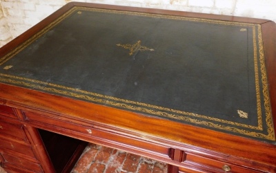 A Victorian mahogany partner's desk, with gilded leather skiver, frieze drawers, and two pedestals with drawers, 80cm high, the top 157cm x 116cm. - 2