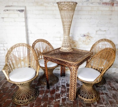 A collection of beige painted metal furniture, constructed to simulate rattan, comprising a table with square top, four chairs, and a further stand for a champagne bucket, lacking glass, the square table 77cm wide.