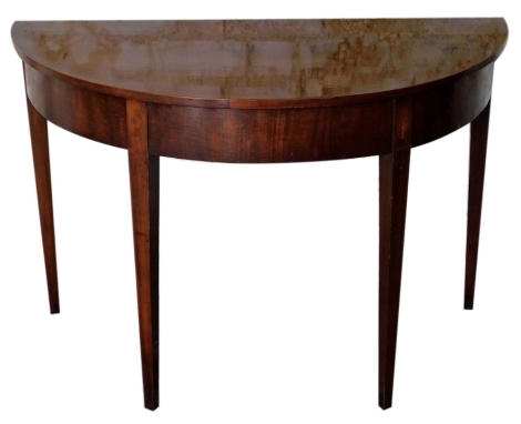 A George III mahogany dining table D end, on square taper legs, 6cm high, 115cm wide, 56cm deep.