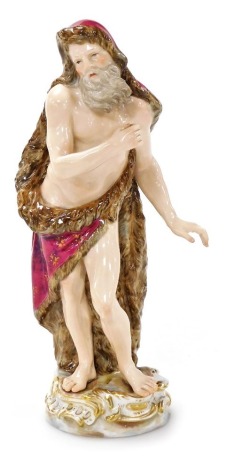 A Meissen porcelain figure, modelled as the allegorical Season of Winter, modelled as a bearded man wearing a fur cloak, lacking flaming brazier to base, blue mark to underside and incised number 6.83, 20cm high. (AF)