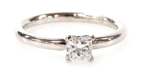 An 18ct white gold and diamond solitaire ring, with a princess cut diamond totalling 0.42ct, colour G-H, clarity SI1-2, in a four claw setting, on plain design band, ring size N, 3g all in.