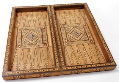 A Moorish inlaid backgammon box, profusely inlaid with finely detailed parquetry panelling and with mother of pearl, 7.5cm high, 9.5cm wide, 24.5cm deep. - 2