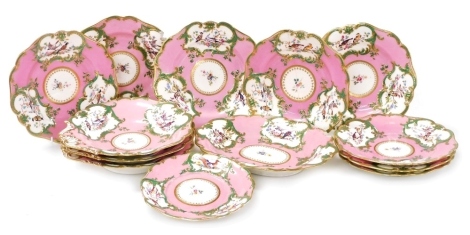 A mid 19thC porcelain dessert service, probably Minton, decorated with reserves of birds and flowering shrubs, within green and gilt borders, on a pink ground, and with central reserves of flower sprays, comprising one oval serving dish, 29cm, three servi