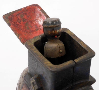 A small 19thC bronze statue of Napoleon, in a standing pose with folded arms, on a square plinth, together with a small cast bronze patinated and painted figure of an Oriental child on a rug, and a cast iron model of an elephant, trunk lacking. (3) - 3