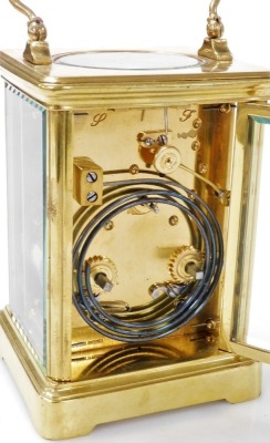 A brass cased carriage clock bearing Scouting crest, with white enamel dial and Roman numerals, the plain brass case with Scouting crest and motto 'Be Prepared' to the centre to case, the eight day movement with fast/slow regulator, and coil striking, 17. - 3