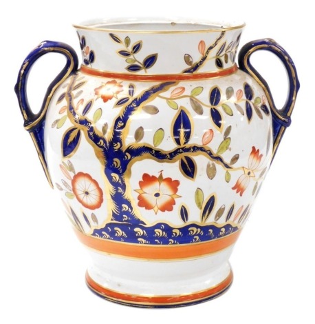 A large Victorian ironstone china two handled ovoid jar, lacking cover, painted in the Imari palette with flowering shrub decoration, and with gilt highlights, with back stamp, diamond registration mark, and Paris to the underside, 31cm high.