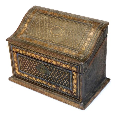 A late Victorian gilt tooled leather slip top stationary box, with a fitted interior, 25cm wide.