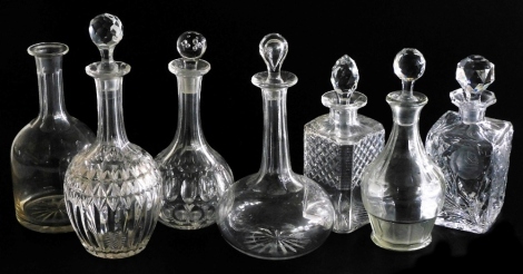 A collection of 19thC and later decanters, to include three bottle shaped decanters and stoppers, two square section decanters, etc. (7)