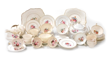 A Victorian Coalport style part tea service, decorated with sprays of flowers and Billingsley Roses and sprays of summer flowers, with gilt borders, and comprising eighteen cups in varying sizes, saucers in varying sizes, two bread and butter plates, a tw