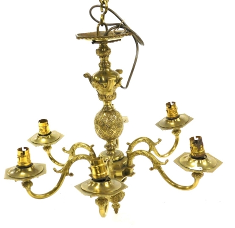 A heavy brass six branch pendant light fitting, with knopped stem and acanthus capped scrolling branches, terminating in hexagonal sconces, 42cm high.