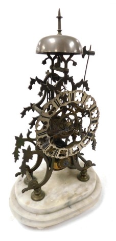 A late 19thC brass skeleton clock, with a pierced silver dial bearing Roman numerals, fusee movement with bell strike, the frame of foliate scrolling form, raised on an oval stepped marble base, with pendulum, 44cm high.