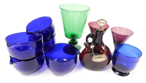 A group of 19thC coloured glassware, including six Bristol Blue glass wine rinsers, an amber glass whisky decanter, with mother of pearl whisky stopper, and a plated whisky decanter label, and a pair of amethyst wine glasses. (10)