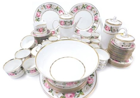 A Royal Worcester Royal Garden pattern porcelain part dinner, tea and coffee service, including a pair of coffee pots, fruit bowl, dinner plates, cream boat and sucriers, soup bowls, demitasse coffee cans and saucers, etc. (a quantity)