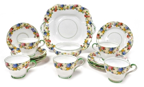 An early 20thC Aynsley porcelain part tea service, decorated with blossom, pattern number B1494, comprising bread plate, sugar bowl, five teacups, four saucers, and five tea plates.