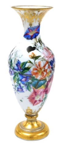 A late 19thC French opaline glass vase, possibly Baccarat, of baluster form, painted with flowers, gilt heightened, 39cm high.