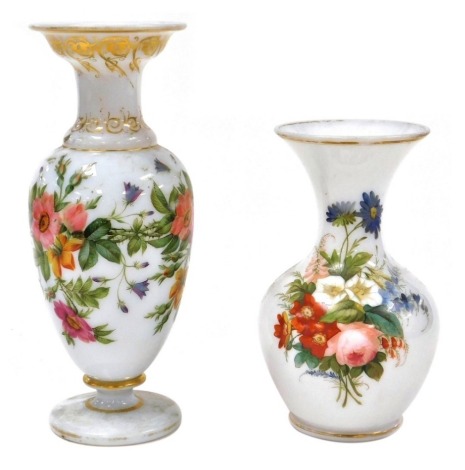 A late 19thC French opaline glass vase, painted with flowers, 22cm high, and a further opaline glass vase, similarly painted with flowers, 29.5cm high. (2)