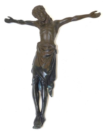 An early 20thC Continental bronze figure of the crucified Christ, backing cross lacking, 54cm high.