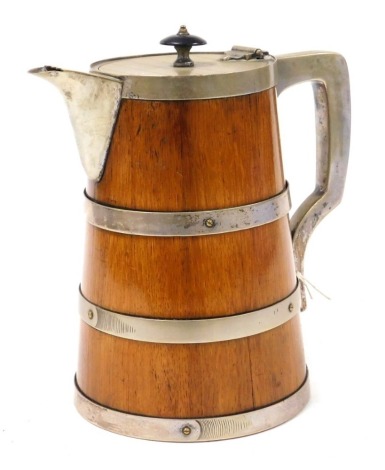 A Victorian pottery and oak bound flagon, with plated strap work, spout and handle, 21cm high.