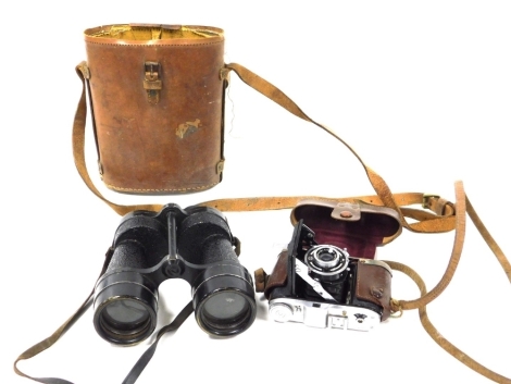 A pair of Ross of London military binoculars, Bino Prism number 5, mark IV x7, recd number 74814, OS735GA, cased, together with a Balda camera, with a Prontour S lens, cased. (2)