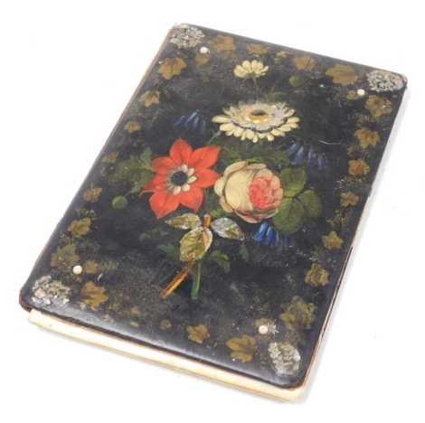 A Victorian painted papier mache blotter, decorated with flowers, 23cm high, 15.5cm wide.