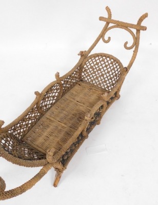 A late 19thC bamboo and cane work crib, 97cm wide. - 2