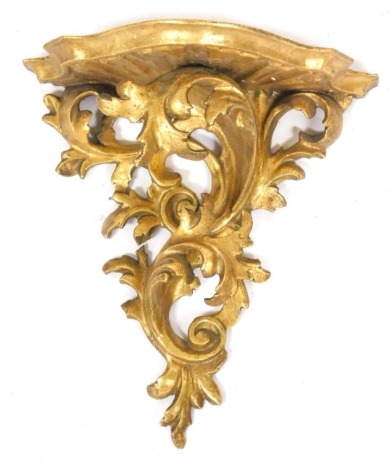 A late 19thC giltwood wall bracket, with foliate carving, 23cm high.