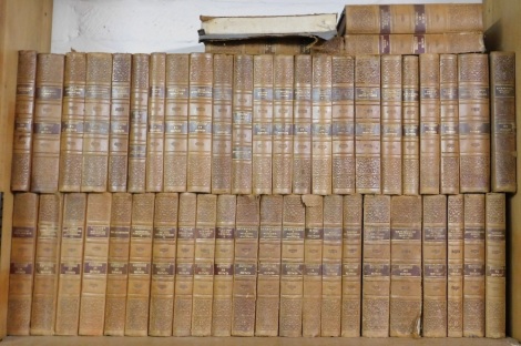 Various 20thC leather bindings, published in Danish, to include works by Emily Bronte, Henry Fielding, Alexandre Dumas, Dostoevsky, Charles Dickens, etc., gilt half calf and marbled boards, published by Gyldendals Forlagstrykkeri Denmark. (a quantity)