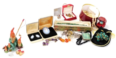 Silver and costume jewellery, including silver charm bracelet, French jet beads, Egyptian pendant, Wedgwood light blue jasper earrings and a brooch, amber set earrings and ring, and a jade bracelet.