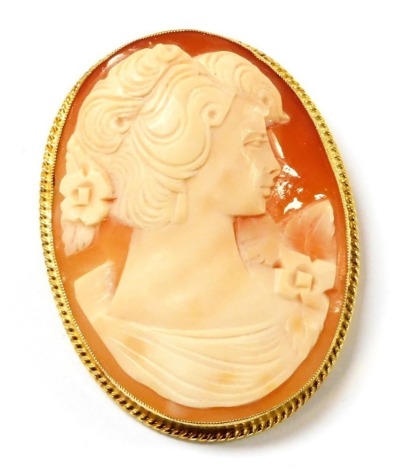 A shell cameo brooch, bust portrait of a lady, in a 9ct gold mount, 4.5cm x 3.5cm, 12.2g.