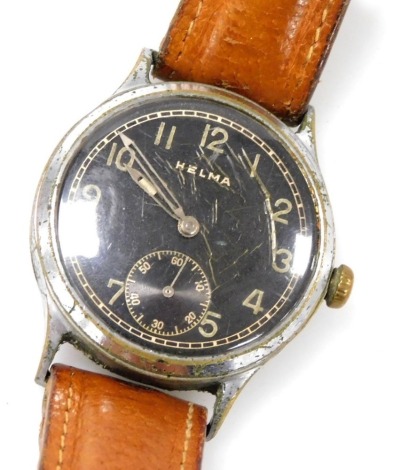 A Helma gentleman's stainless steel cased wristwatch, circular black dial bearing Arabic numerals, subsidiary seconds dial, case back serial no D045956H, Stahlboden stamp, on a tan leather strap.