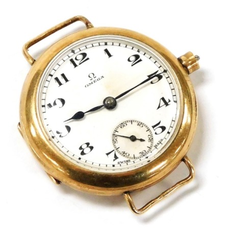 A George V Omega 9ct gold cased wristwatch, circular enamel dial bearing Arabic numerals, subsidiary seconds dial, fifteen jewelled adjusted movement, number 5335588, the case of plain form, Sheffield 1924, 24.7g all in.