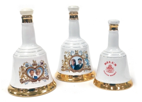 Three Bell's Scotch whisky royal commemorative decanters, comprising Prince Andrew and Sarah Ferguson 1986 decanter 75cl, Prince Charles and Lady Diana 1981 decanter 75cl, and a commemorative birth of Prince Henry of Wales 1984 decanter, 50cl, with conten