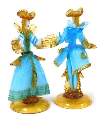 A pair of Murano glass figures by C. Toffolo, modelled as a lady and gentleman, each signed to base, 32cm high.