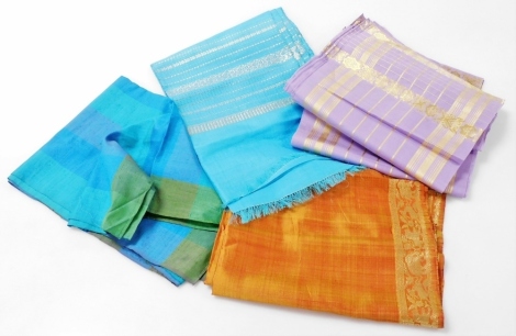 Four Indian silk scarves, comprising, an orange scarf gold embroidered to the border with birds and wild animals, turquoise scarf with silver embroidered floral and geometric banding, green and blue check scarf, and a lilac scarf with gold banded and flor